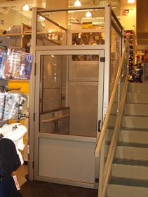 The Genesis Enclosure vertical wheelchair lift makes your commercial property more accessible from inside and out near syracuse ny