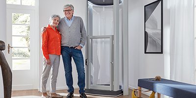 best wheelchair lifts From Syracuse Elevator Elderly Couple Proudly Standing Near Their wheelchair lift header image