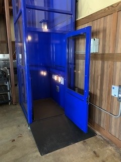 Wheelchair Lifts Near Syracuse NY Image of Door Opening of Blue Wheelchair Lift