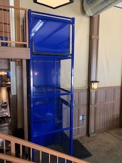 Elevator Companies Near Syracuse NY Front View of Blue Wheelchair lift