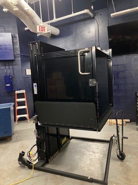 Syracuse-NY-Business-Portable-Wheelchair-Lift-Garaventa-from-Syracuse-Elevator-side-view-image-of-black-wheelchair-lift