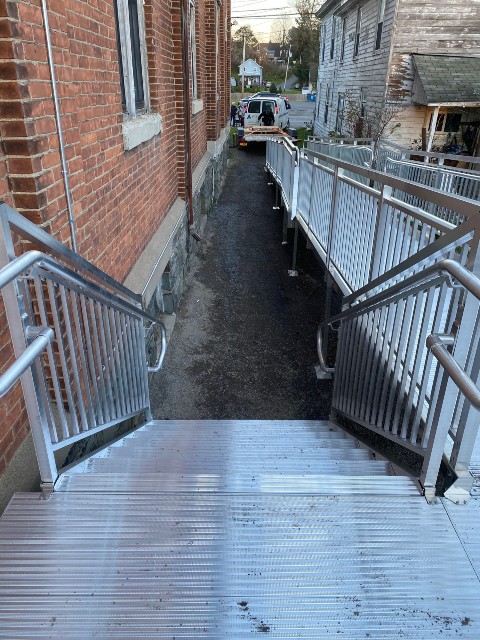 Syracuse-NY-Business-Wheelchair-Ramp-from-Syracuse-Elevator-West-Winfield-New-York image-of-the-view-from-the-top-of-aluminum-stairs