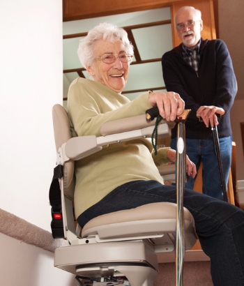 woman on stair chair lift from syracuse elevator